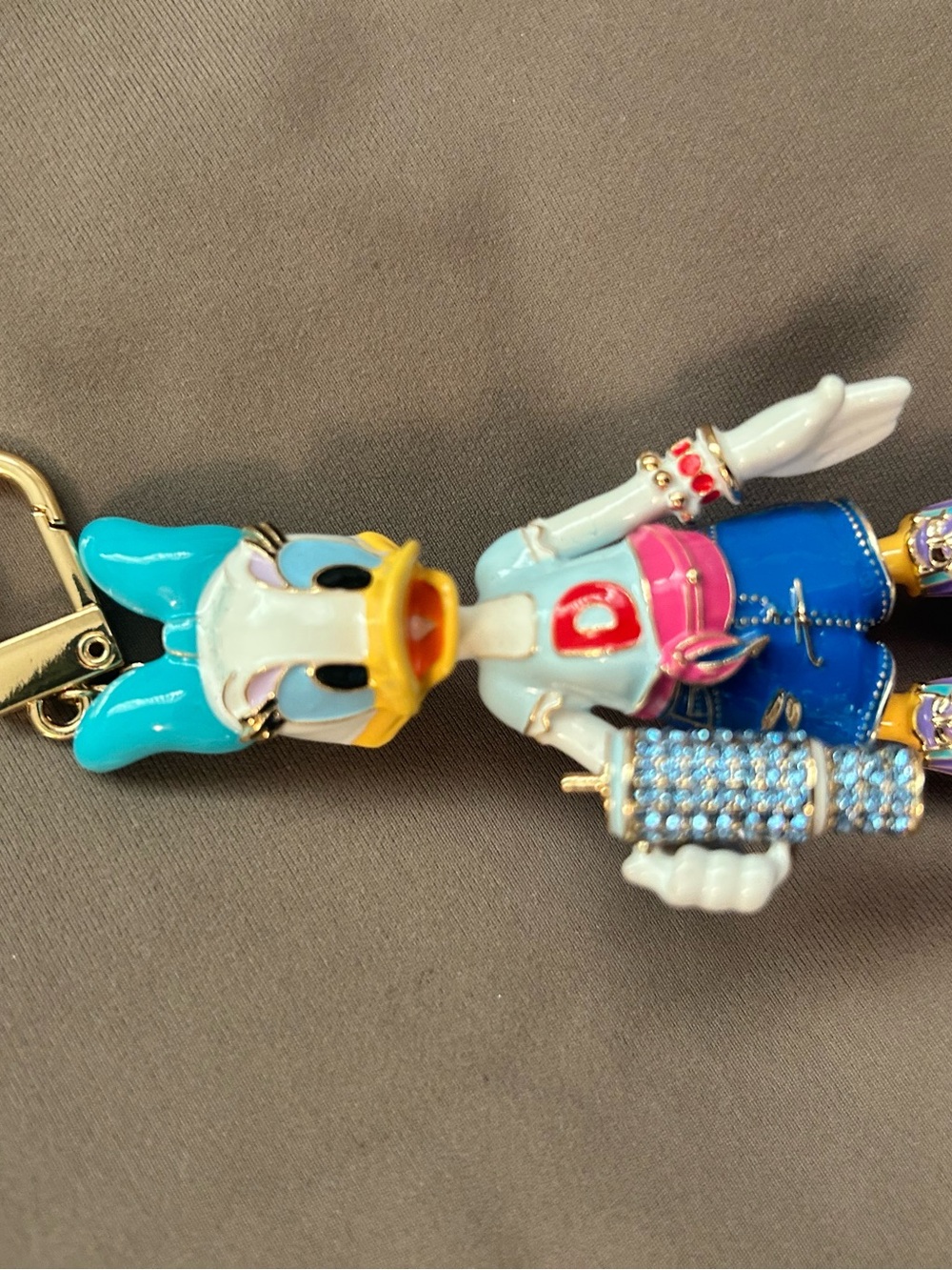 BaubleBar Blue & Pink Daisy Duck Enamel Key Charm
